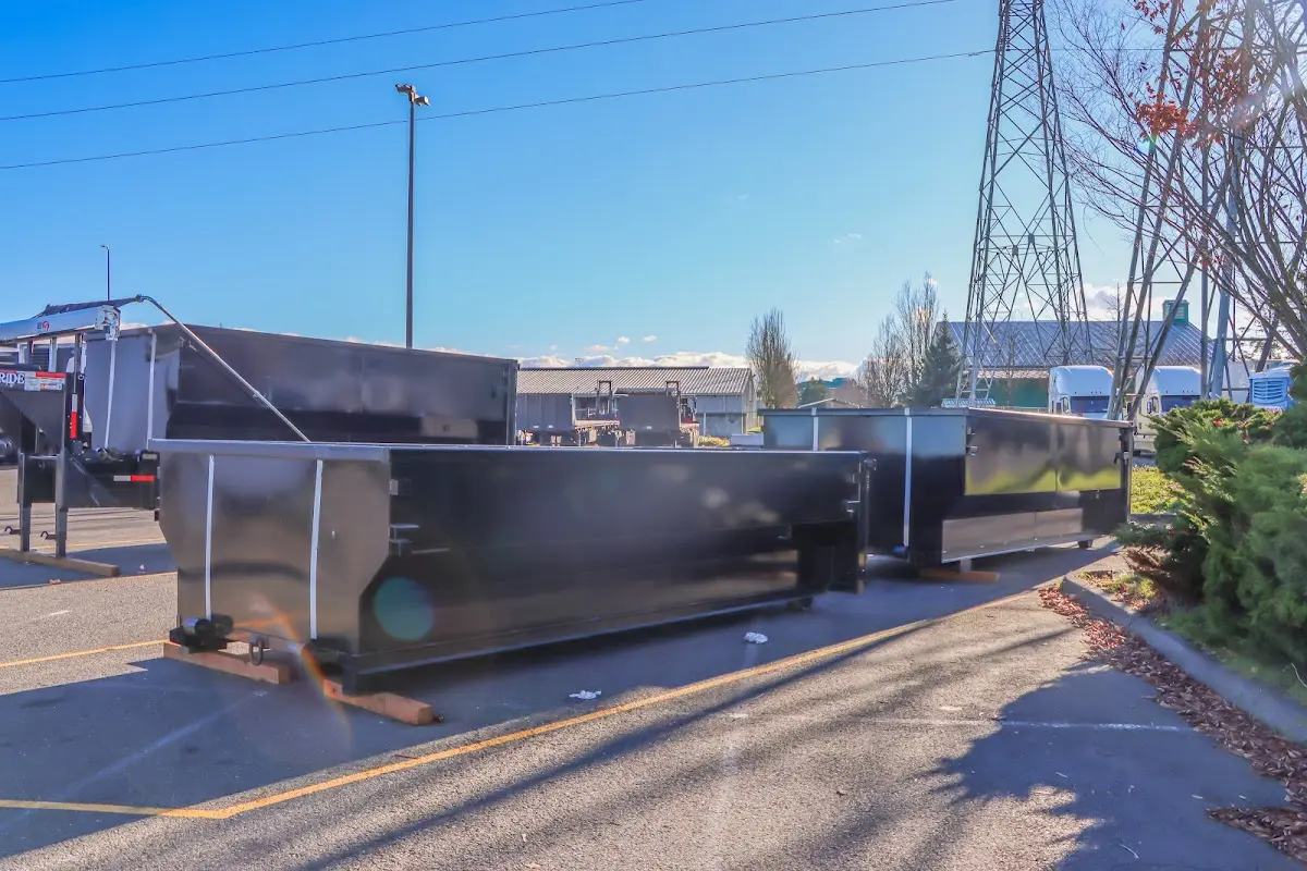 Roll-off dumpster ready for waste disposal at job site for 15 Yard Dumpster Rental in Dent